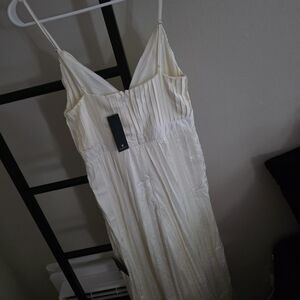 Elegant Cream Pleated Romper